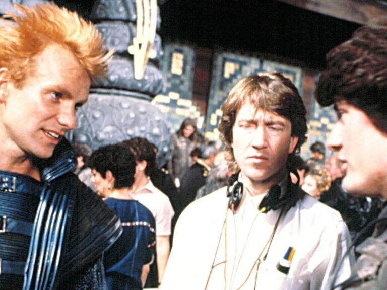 Behind-the-scenes photo of Sting as Feyd-Rautha, Kyle MacLachlan as Paul Atreides, as Kyle MacLachlan as Paul Atreides and David Lynch