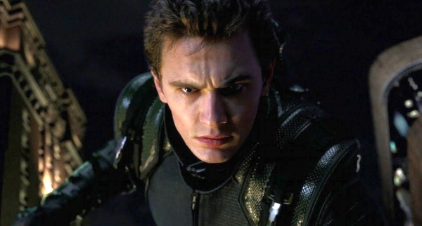James Franco as Harry Osborn in Spider-Man 3, wearing the New Goblin tactical suit with a focused and determined expression against a dark New York City skyline at night.