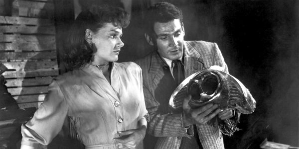 Movie still of Ann Robinson as Sylvia Van Buren, and Gene Barry as Dr. Clayton Forrester in the sci-fi movie The War of the Worlds (1953)