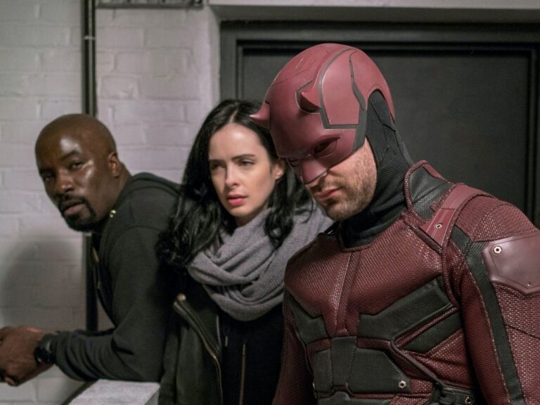 Television still of Mike Colter as Carl Lucas / Luke Cage, Charlie Cox as Matt Murdock / Daredevil, and Krysten Ritter as Jessica Jones in Marvel's The Defenders