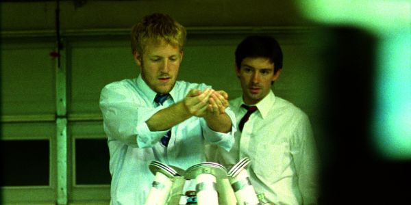 Movie still of David Sullivan as Abe and Shane Carruth as Aaron in Primer (2004)