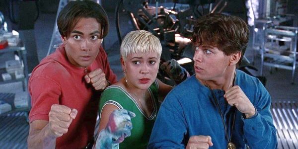 Movie still of Mark Dacascos as Jimmy Lee and Alyssa Milano as Marian Delario and Scott Wolf as Billy Lee in Double Dragon (1994)