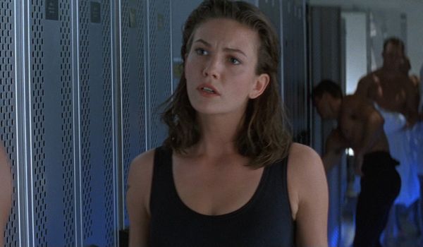 Movie still of Diane Lane as Judge Hershey in the locker room in Judge Dredd (1995)