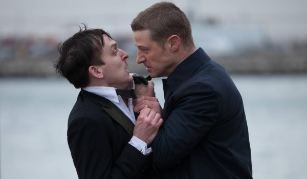Television still of Robin Lord Taylor as Oswald Cobblepot/Penguin and Ben McKenzie as James Gordon in the Gotham episode Pilot