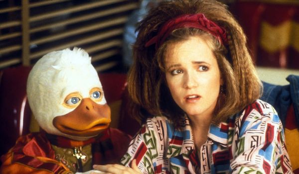 Movie still of Ed Gale as Howard T. Duck and Lea Thompson as Beverly Switzler in Howard the Duck (1987)