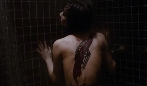 Movie still of Bai Ling as Myca shower in The Crow (1994)