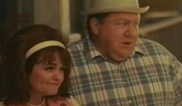 Movie still of George Wendt as Charlie and Julie Brown as Rhonda in Alien Avengers II (1997)