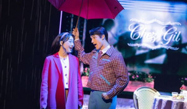 Theater publicity photo of Helen J Shen as Claire and Darren Criss as Oliver in Maybe Happy Endings (2024)