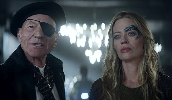 Television still of Patrick Stewart as Jean-Luc Picard and Jeri Ryan as Seven of Nine in the Star Trek: Picard episode Stardust City Rag