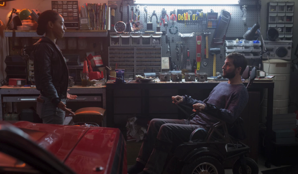 Movie still of Betty Gabriel as Detective Cortez and Logan Marshall-Green as Grey Trace in Upgrade (2018)