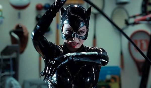 Movie still of Michelle Pfeiffer as Selina Kyle / Catwoman in Batman Returns (1993) with a whip