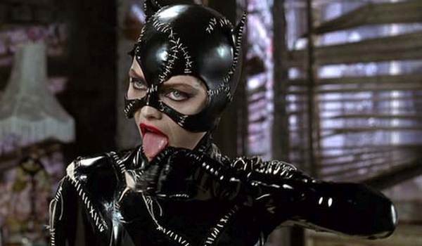 Movie still of Michelle Pfeiffer as Catwoman in Batman Returns (1993) licking herself