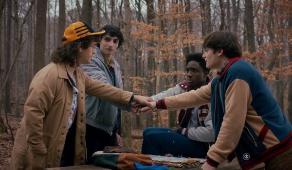 Television still of Gaten Matarazzo as Dustin Henderson, Finn Wolfhard as Mike Wheeler, Caleb McLaughlin as Lucas Sinclair, Noah Schnapp as Will Byers in the Stranger Things episode "Chapter One: The Crawl"