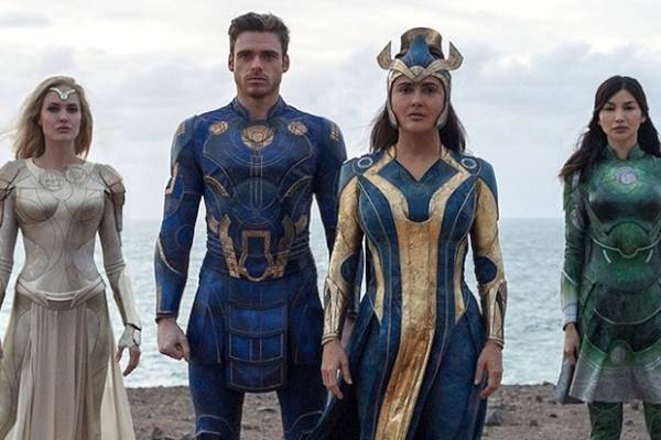 Movie still of Angelina Jolie as Thena, Richard Madden as Ikaris, Salma Hayek as Ajak, and Gemma Chan as Sersi in the Marvel Cinematic Universe movie Eternals (2021)