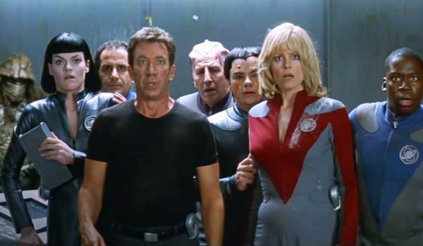 Movie still of Missi Pyle as Laliari, Tony Shalhoub as Fred Kwan, Tim Allen as Jason Nesmith, Alan Rickman as Alexander Dane, Jed Rees as Teb, Sigourney Weaver as Gwen DeMarco, and Daryl Mitchell as Tommy Webber  in the sci-fi movie Galaxy Quest (1999)