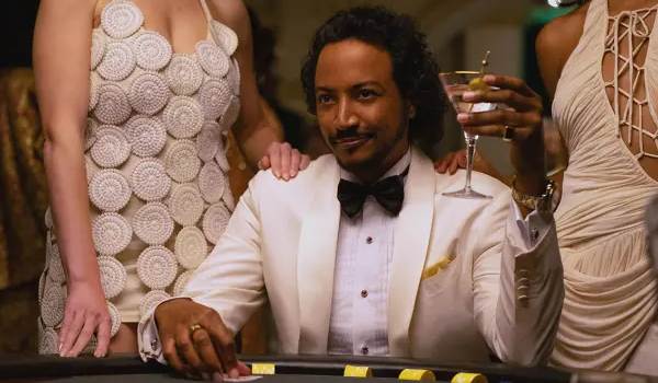 Television still of Samba Schutte as Mr. Koumba Diabaté in the Pluribus episode "HDP"