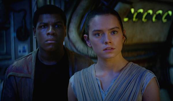 Movie still of John Boyega as Finn and Daisy Ridley as Rey in the sci-fi movie Star Wars: Episode VII - The Force Awakens (2015)
