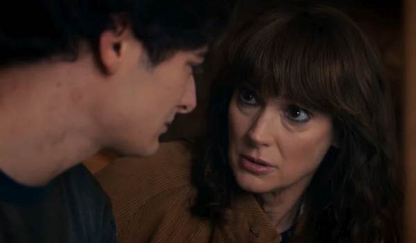 Television still of Finn Wolfhard as Mike Wheeler, Winona Ryder as Joyce Byers in the sci-fi show Stranger Things episode "Chapter Seven: The Bridge"