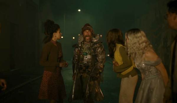 Movie still of Zazie Beetz as Janet, Sam Rockwell as Man From the Future, Georgia Goodman as Marie, and Haley Lu Richardson as Ingrid in the sci-fi movie Good Luck, Have Fun, Don't Die (2026)