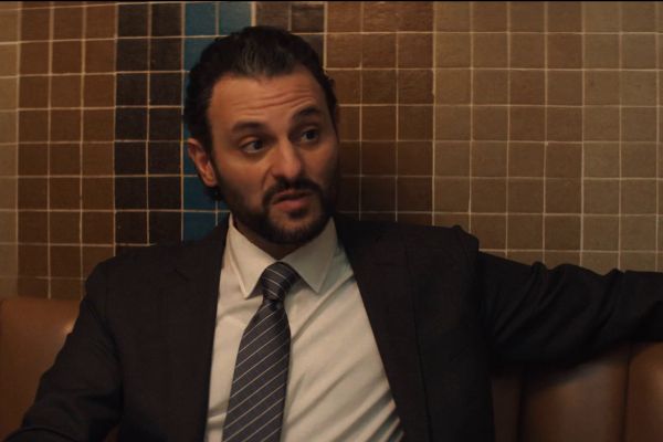 Television still of Arian Moayed as Agent P. Cleary in the sci-fi show Wonder Man