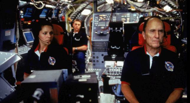 Movie still of Mary McCormack as Andrea Baker, Ron Eldard as Oren Monash, and Robert Duvall as Spurgeon Tanner in the sci-fi movie Deep Impact (1998)