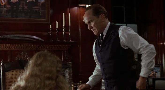 Movie still of Natasha Richardson as Kate / Offred, and Robert Duvall as Commander in the sci-fi movie The Handmaid's Tale (1990)