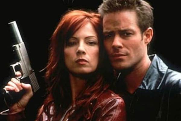 Television still of Sebastian Spence as Cade Foster, Stacy Grant as Hannah Foster in the sci-fi show First Wave