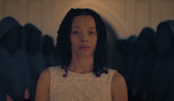 Television still of Chase Infiniti as Agnes MacKenzie in the sci-fi show The TestamentsTelevision still of Chase Infiniti as Agnes MacKenzie in the sci-fi show The Testaments