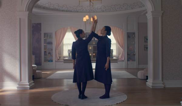 Television still of Mattea Conforti as Becka Grove, Chase Infiniti as Agnes MacKenzie in the sci-fi show The Testaments