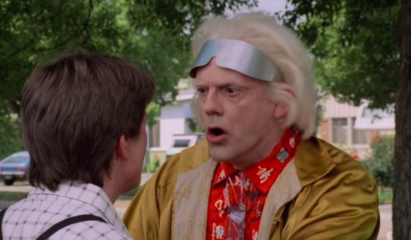 Christopher Lloyd as Doctor Emmett Brown telling Michael J. Fox as Marty McFly about his kids in the sci-fi movie Back to the Future Part II (1989)