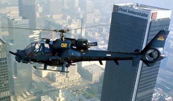 Roy Scheider as Frank Murphy piloting the Blue Thunder tactical helicopter over the Los Angeles skyline in a scene from the 1983 film Blue Thunder.