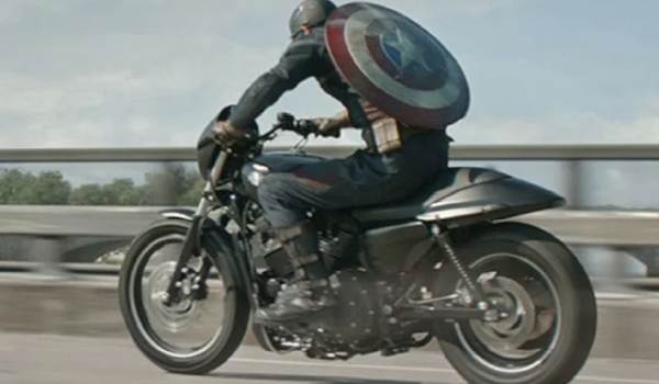  Chris Evans as Steve Rogers riding a Harley-Davidson in a scene from the film The Avengers.