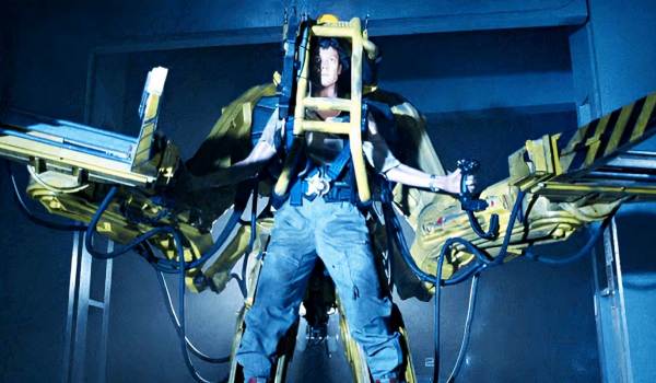 Sigourney Weaver as Ellen Ripley operating the P-5000 Power Loader in a scene from the 1986 film Aliens.