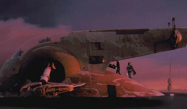 The Star Wars starship Slave I docked at Cloud City during a sunset.