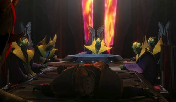 A cinematic shot from Star Wars: The Clone Wars Season 5, Episode 14, 'Eminence'. In a dimly lit chamber on Mustafar, the green-skinned Black Sun ruling council sits around a dark table. In the foreground, their leader Xomit Grunseit lies dead, slumped over the table, following his execution by Savage Opress.