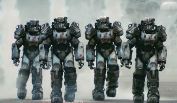 Soldiers of the Brotherhood of Steel walking in T-60 Power Armor in a scene from the Fallout television series.