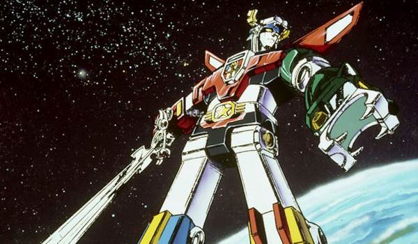 The Defender of the Universe holding the Blazing Sword in space in a scene from the animated series Voltron.