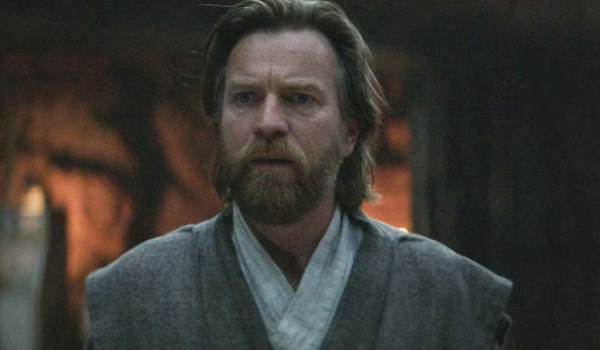 A close-up of a weary and concerned Obi-Wan Kenobi (Ewan McGregor) wearing simple tunics in the 2022 series Obi-Wan Kenobi.