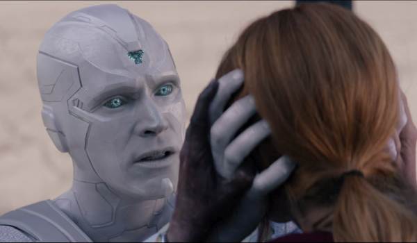 Television still of Paul Bettany as White Vision fighting Elizabeth Olsen as Wanda Maximoff in the sci-fi show WandaVision