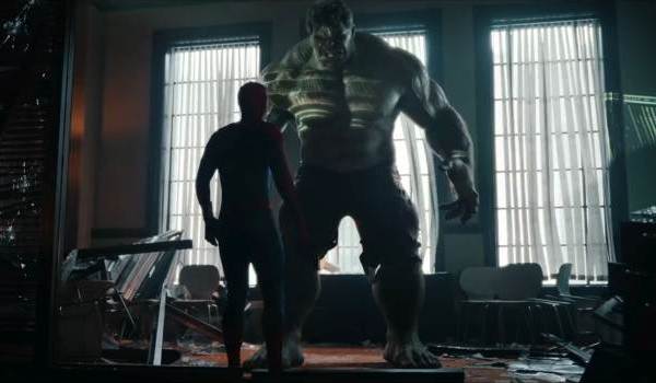 Spider-Man (Tom Holland) seen from behind, facing a massive, menacing Hulk (Mark Ruffalo) looming over him in a dimly lit, ruined room from Spider-Man: Brand New Day.