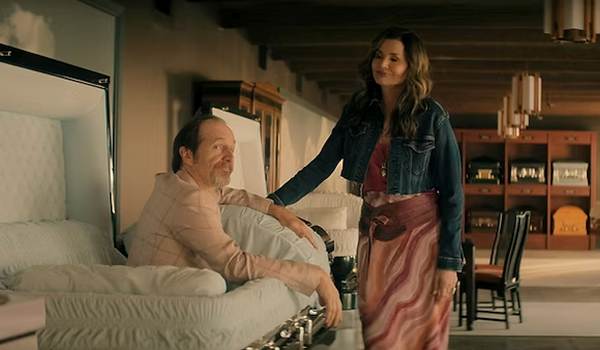 Television still of Denis O'Hare as Wally Baker, Geena Davis as Renee Joyce in the sci-fi show The Boroughs episode "The Mourning After'"