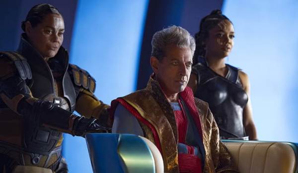 Jeff Goldblum as the Grandmaster flanked by Rachel House as Topaz and Tessa Thompson as Valkyrie in a scene from the 2017 movie Thor: Ragnarok.
