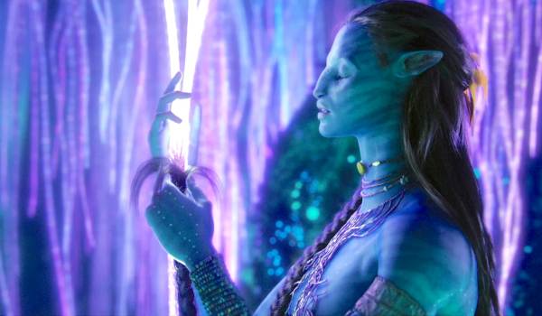 Neytiri, played by Zoe Saldaña, establishing a neural connection with the bioluminescent network of Eywa in the Avatar film series.