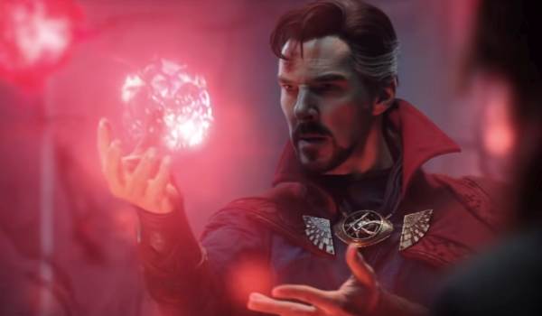 Benedict Cumberbatch as Doctor Strange holding glowing red magic in Doctor Strange in the Multiverse of Madness.