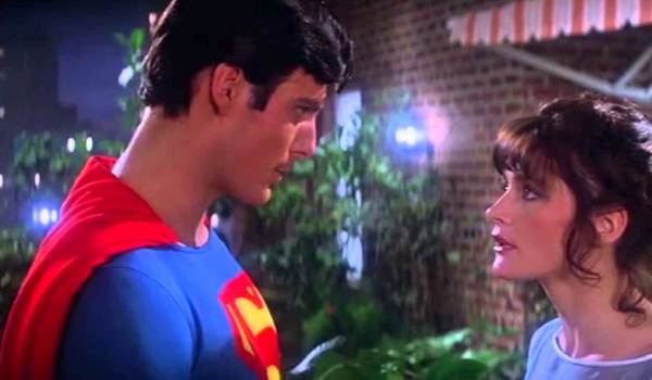 Christopher Reeve as Superman and Margot Kidder as Lois Lane looking at each other in the 1978 film Superman: The Movie.