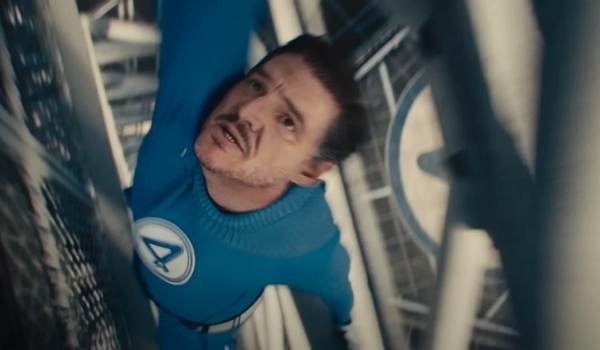 Pedro Pascal as Reed Richards wearing his blue Fantastic Four uniform in the Marvel film The Fantastic Four: First Steps.
