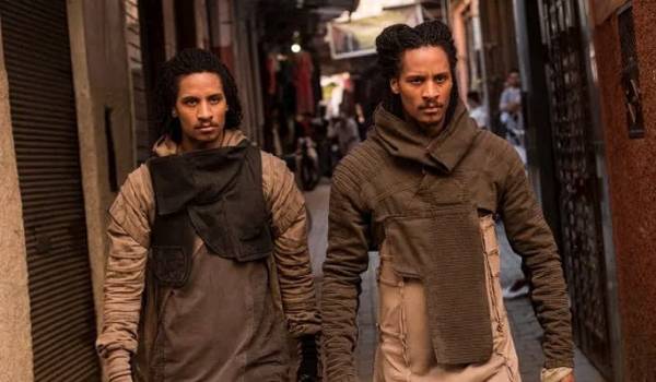 Laurent Bourgeois as Alien Twin, and Larry Bourgeois as Alien Twin in the sci-fi movie Men in Black: International (2019)
