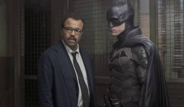 Jeffrey Wright as Commissioner James Gordon, and Robert Pattinson as Bruce Wayne / Batman in the superhero movie The Batman (2022)
